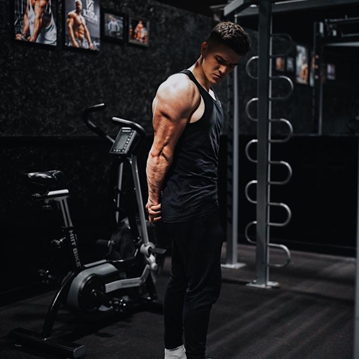 Women in a fitness class doing stretching and mobility exercises